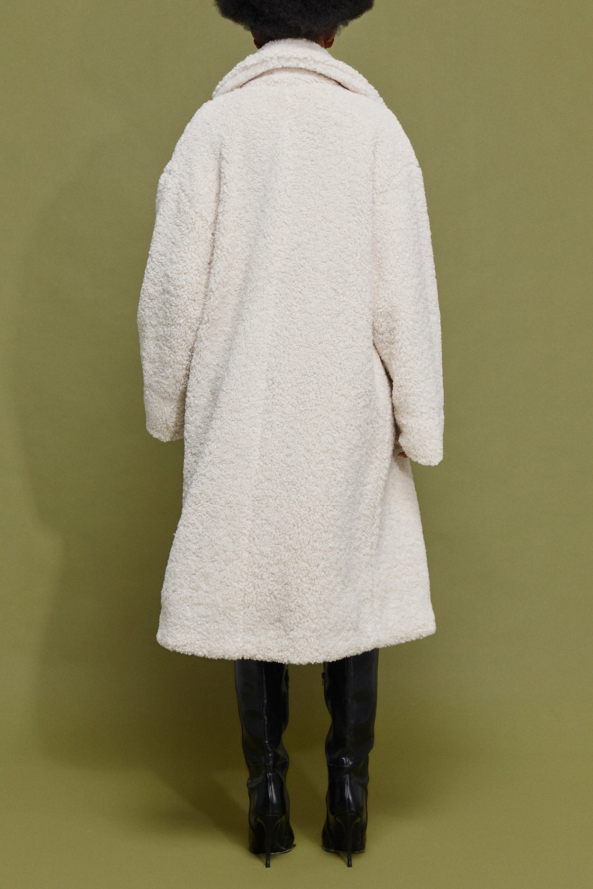 CURLY FAKE FUR COAT WITH LEO LINING