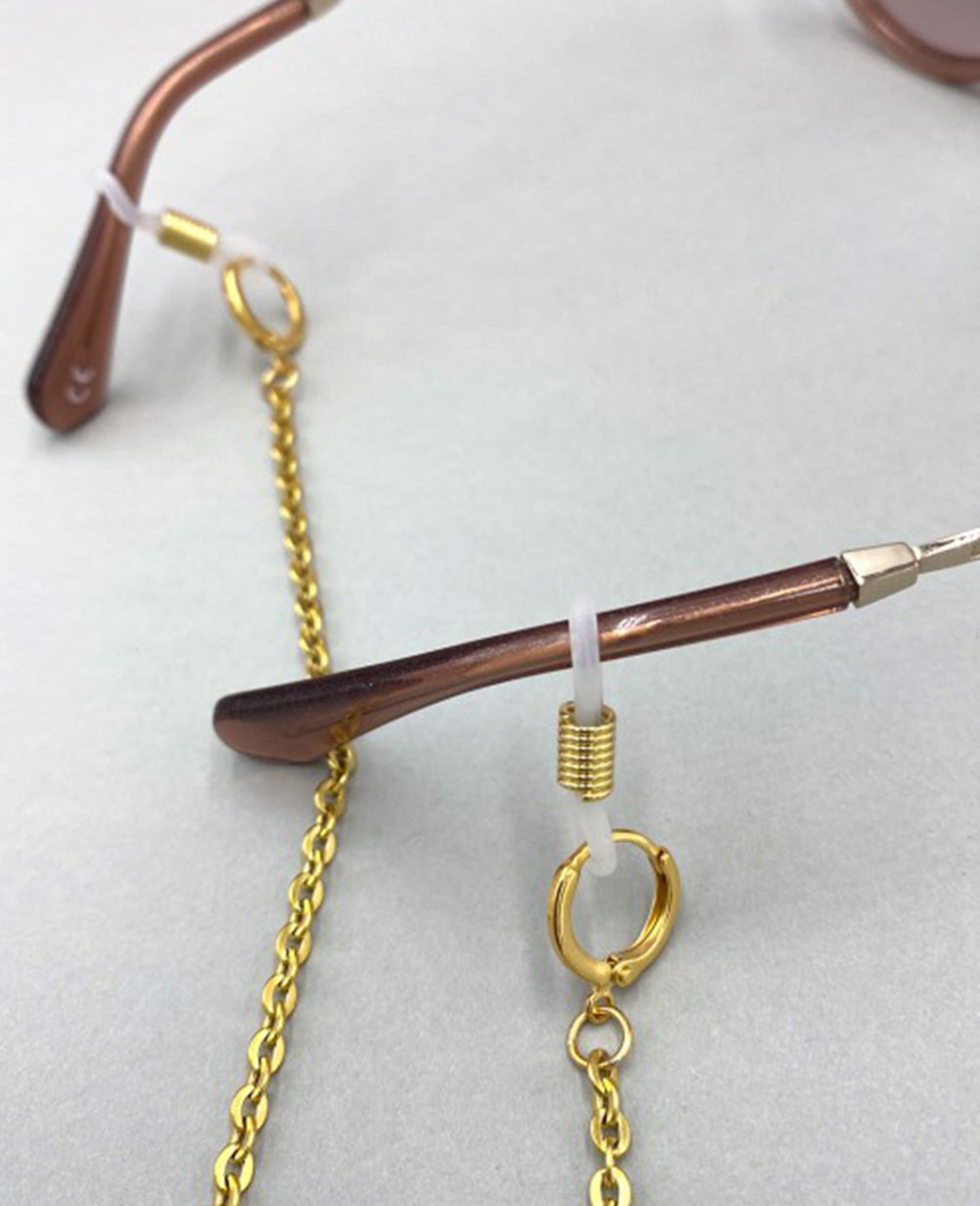 MASKEN- UND BRILLENKETTE "THE BLUE CUBIC"