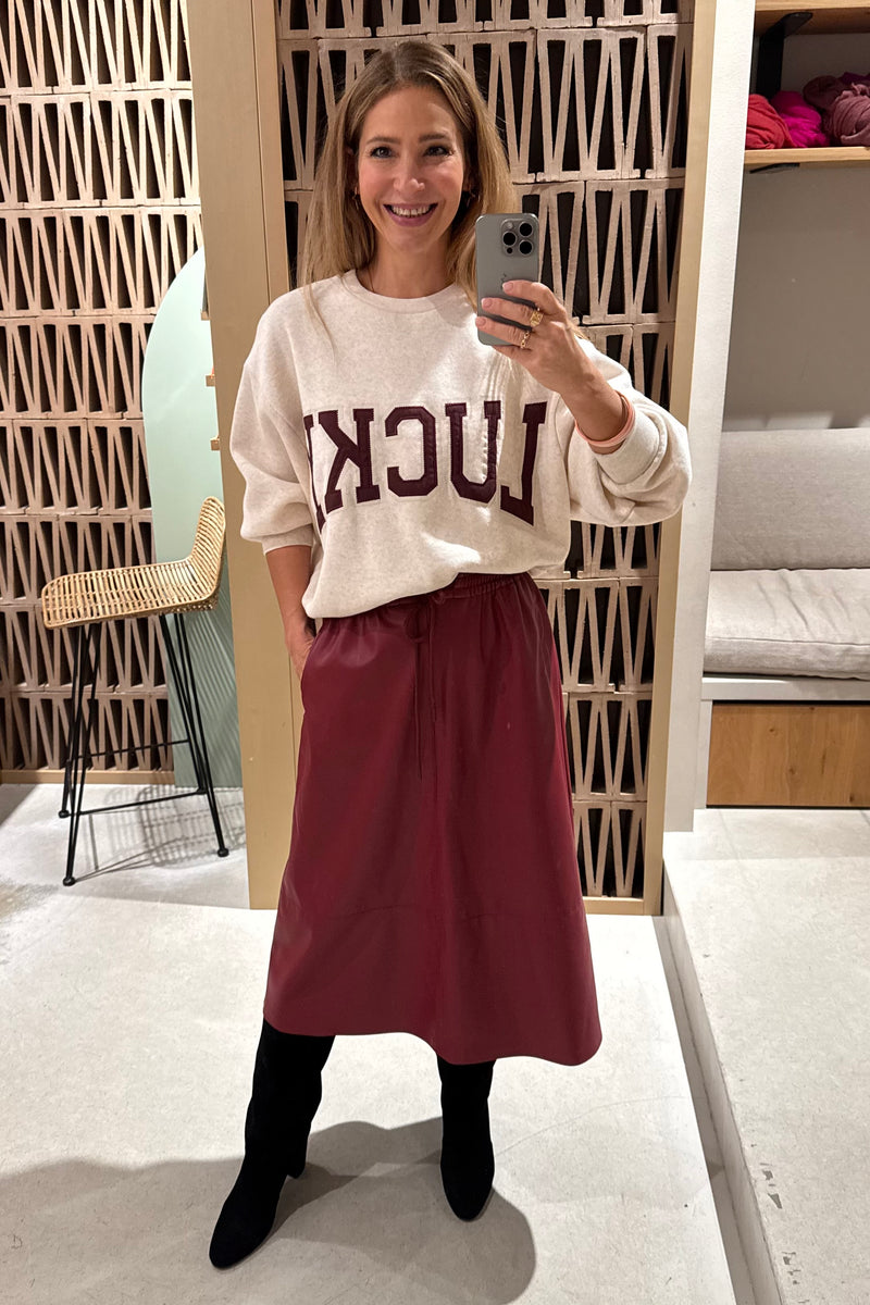 OVERSIZED VEGAN LEATHER DRAWSTRING SKIRT DEEP RED