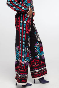 WIDE LEG PANTS WITH PLACEMENT PRINT BLACK/MULTICOLOR