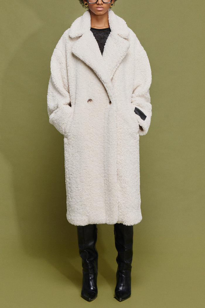 CURLY FAKE FUR COAT WITH LEO LINING