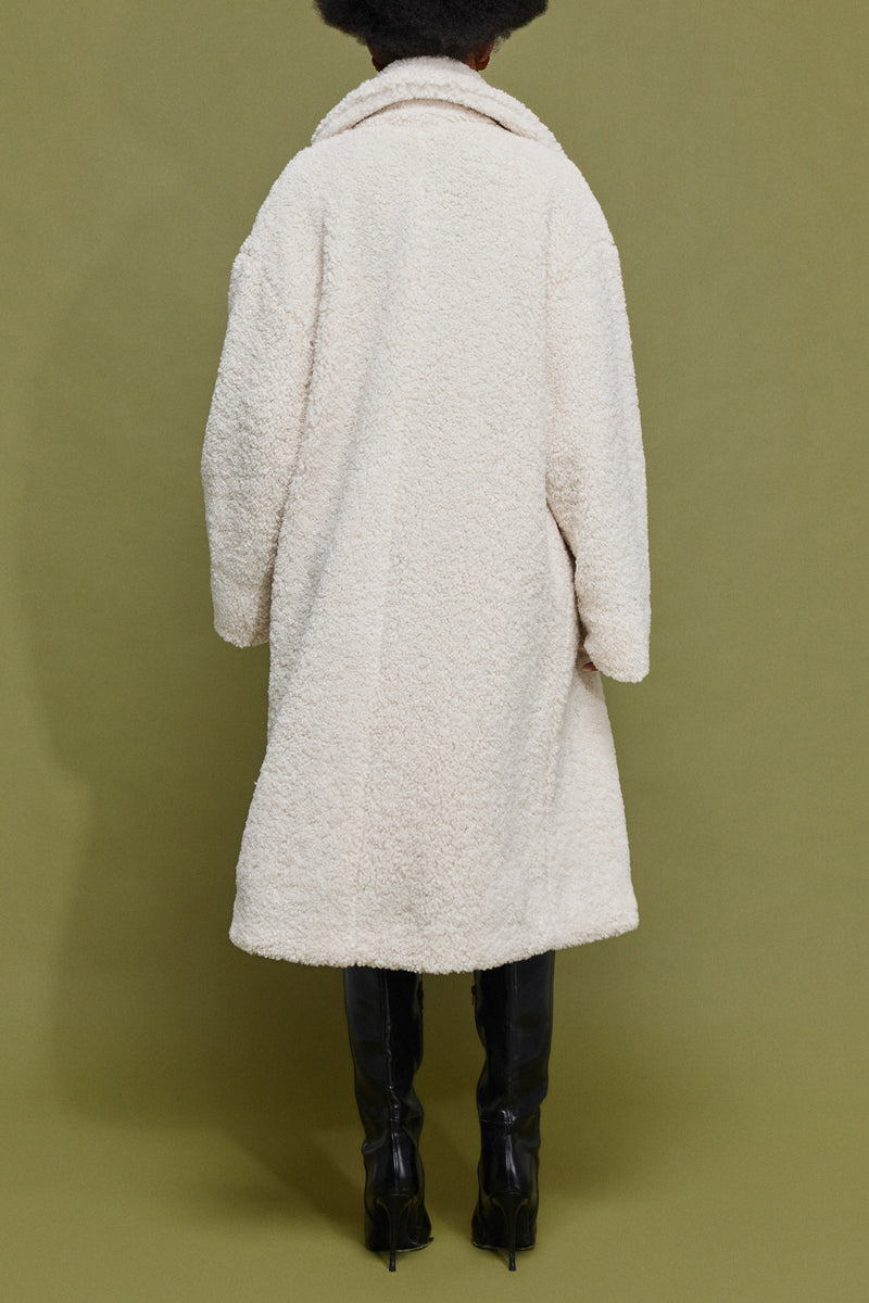 CURLY FAKE FUR COAT WITH LEO LINING