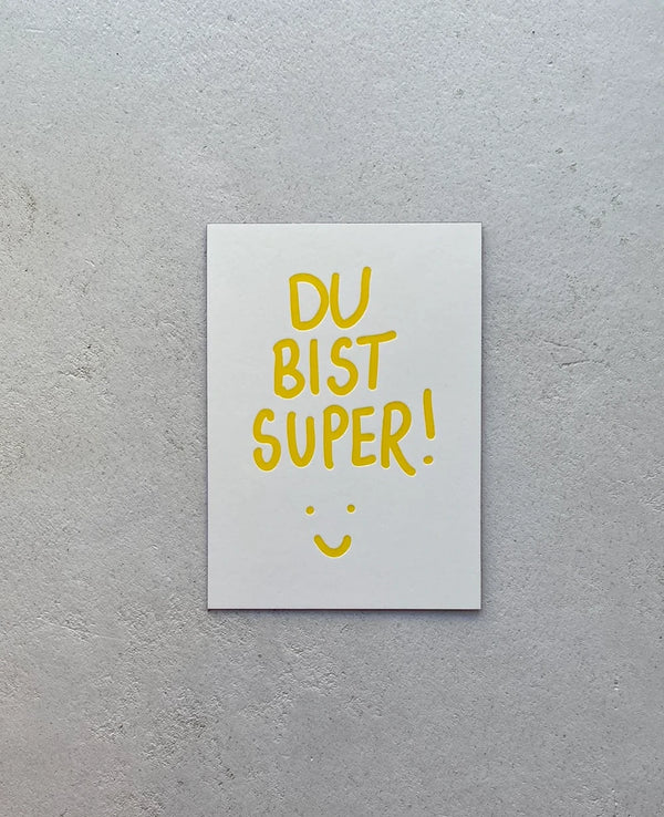 LETTERPRESS CARD "DU BIST SUPER!" YELLOW/LILAC